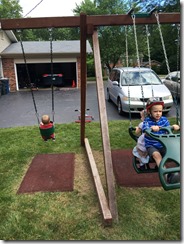 No, Daddy didn't make me wear a helmet to swing...